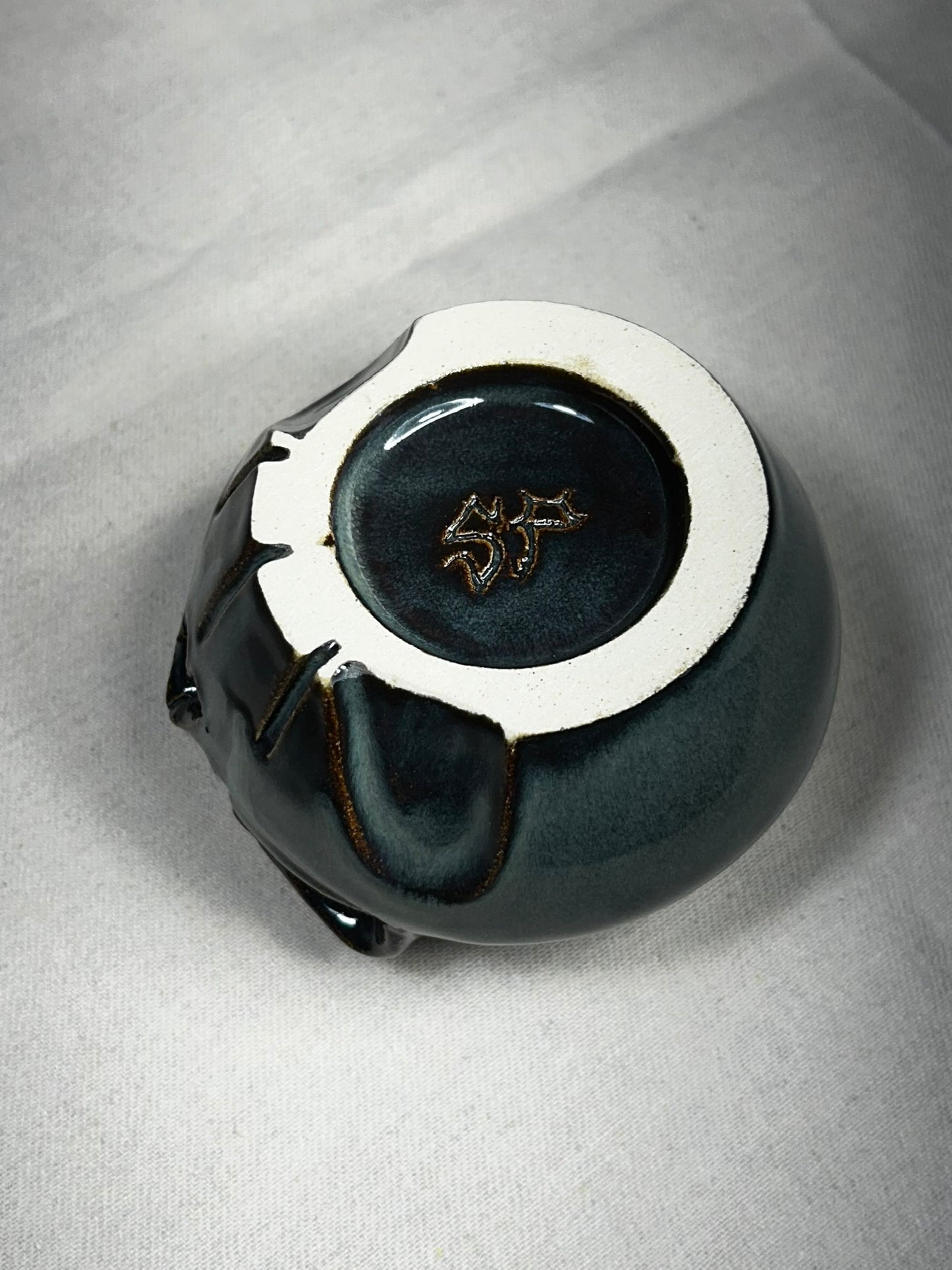 Ash-pot skull (Float)